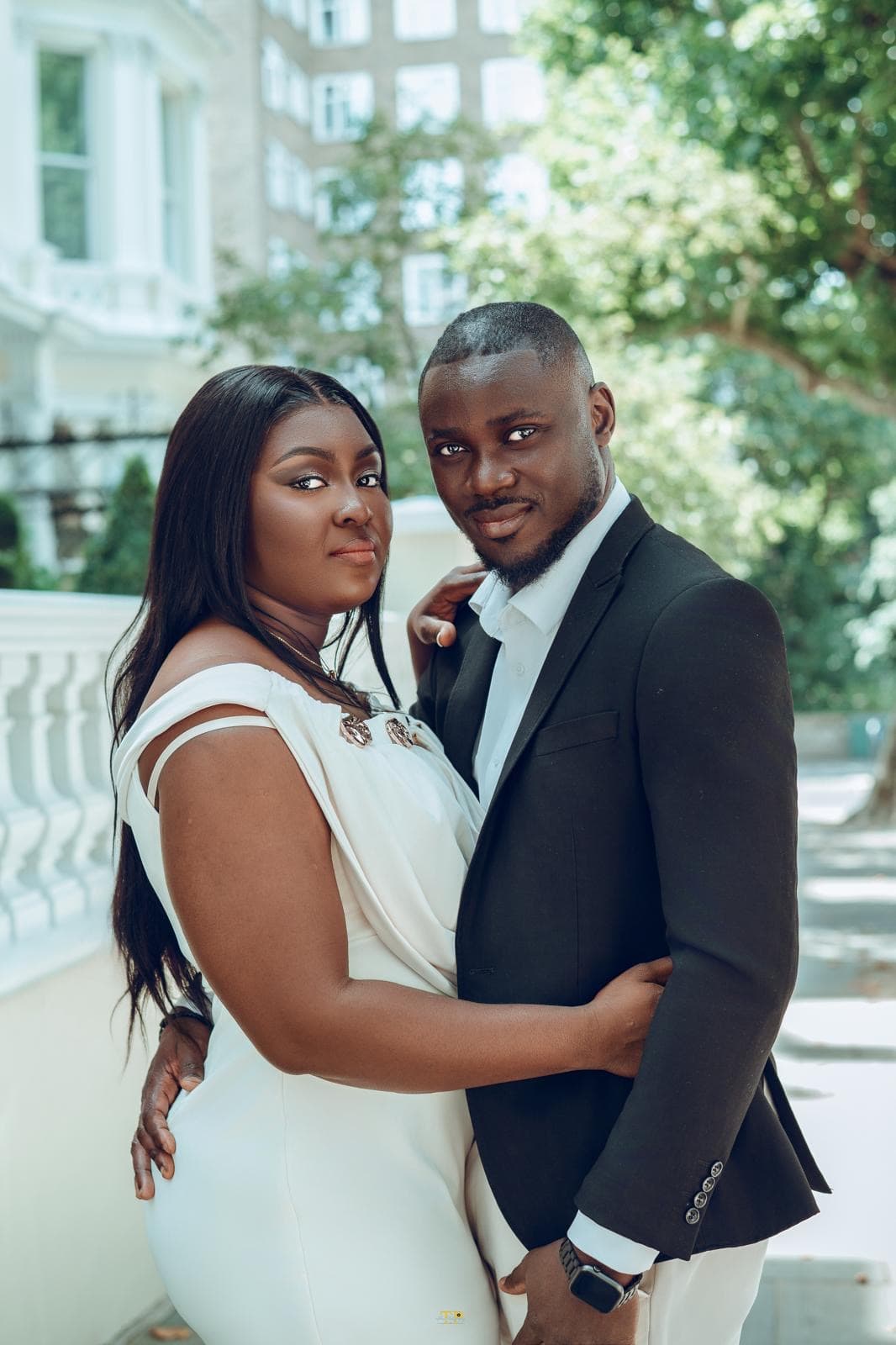 Kwabena and Sandra standing together during their London pre-wedding shoot