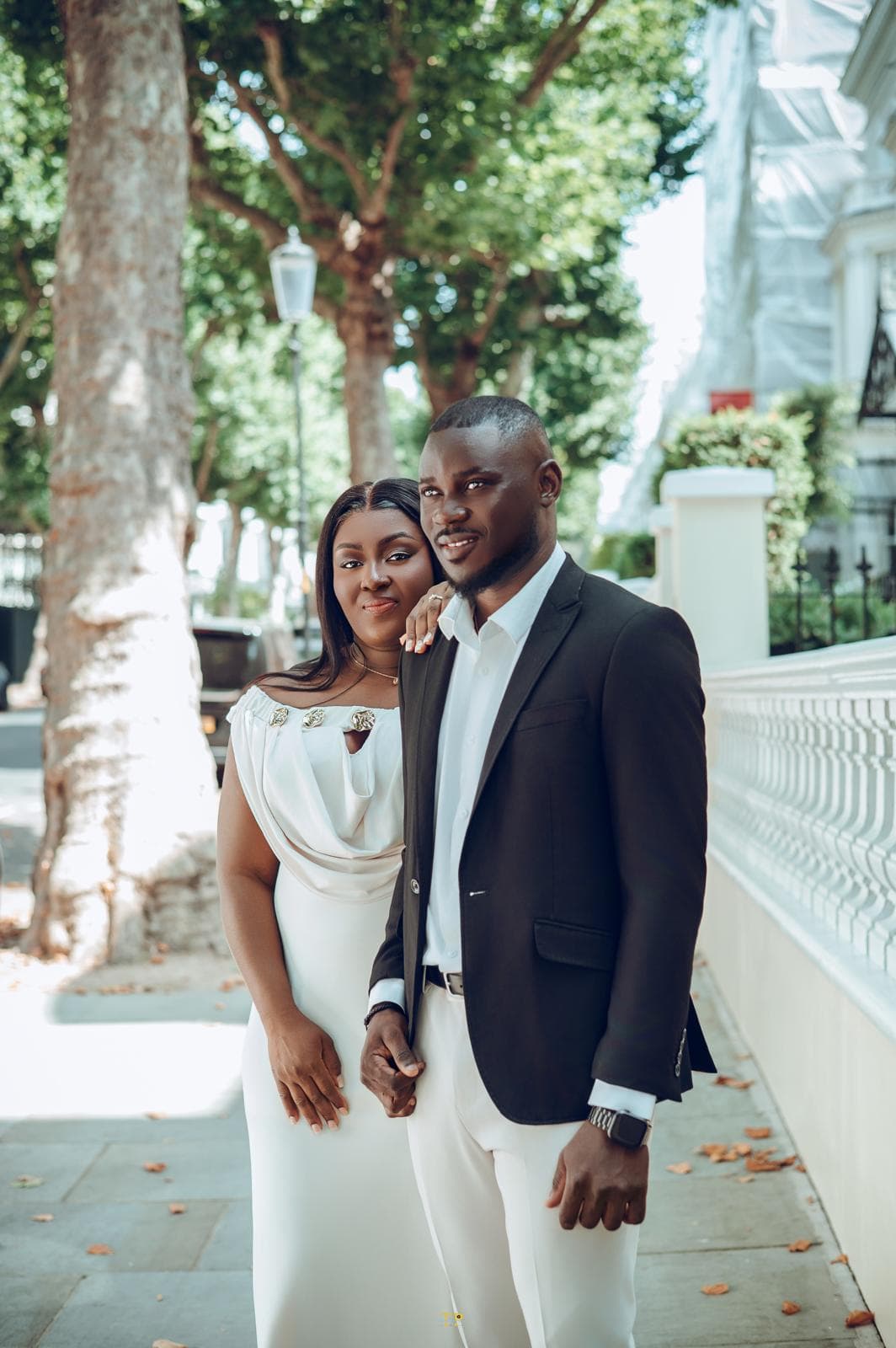 Kwabena and Sandra walking together in London before the wedding